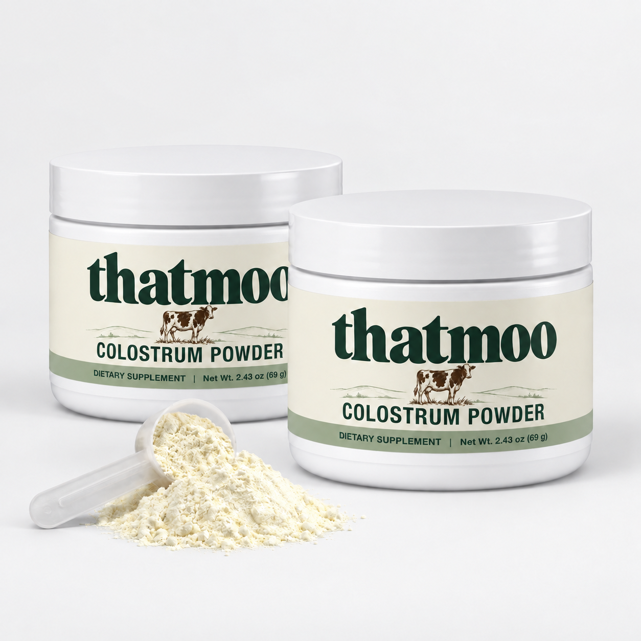 Two closed ThatMoo Colostrum Powder jars with a scoop and ivory powder on a soft light-grey studio background; generated F2 product mockup